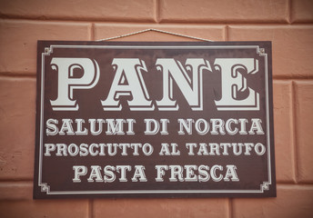Sign with traditional italian food