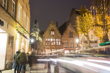 Fototapeta na wymiar Bruges, Belgium - November 24, 2018: Christmas Market by night .