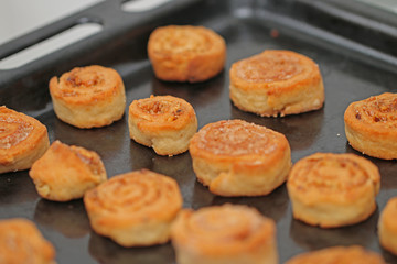 baking in the oven, blushing tasty cookies on the tray