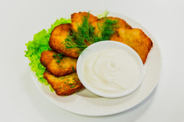 Potato pancakes with sour cream and dill