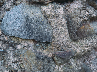 stone wall texture with cracks and patterns on the surface