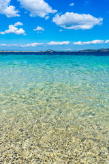 Greece, Zakynthos, Endless blue ocean and green mountains behind