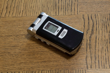 T&eacute;l&eacute;phone portable, GPS, calculatrice, prise chargement