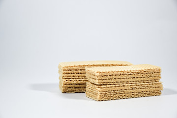 Wafer candy filled with vanilla cream on a white background