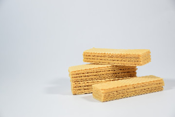 Wafer candy filled with vanilla cream on a white background