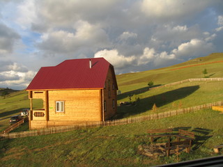 Obraz premium red barn in field