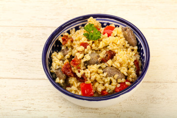 Bulgur with chicken hearts