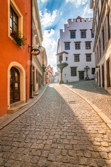 Colorful facades of houses in the historic center of the medieval town Cesky Krumlov, Czech Republic, Europe.