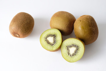 Ripe whole kiwi fruit  isolated on white background