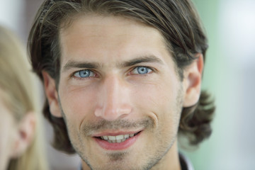 Obraz premium portrait of successful business man in blurred background.