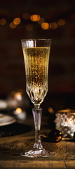 Christmas, New year festive table set with champagne, narrow composition