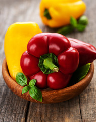 Bell peppers on a wooden background