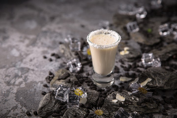 Alcoholic cocktails in shot glasses (shooters). Kamikaze. Cool drink from strong vodka, whiskey and sweet liqueurs. Easy Bartenders Recipes and Ideas