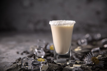 Alcoholic cocktails in shot glasses (shooters). Kamikaze. Cool drink from strong vodka, whiskey and sweet liqueurs. Easy Bartenders Recipes and Ideas
