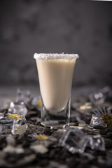 Alcoholic cocktails in shot glasses (shooters). Kamikaze. Cool drink from strong vodka, whiskey and sweet liqueurs. Easy Bartenders Recipes and Ideas