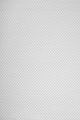 close-up of white or off-white textile fabric with subtle pattern, background texture