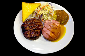 Teriyaki Pork, Ham Steak and Mashed Potatoes on white plate