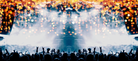 Big concert arena with clapping people