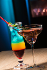 Two exotic cocktails in restaurant