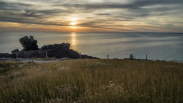 Timelapse of a sunset at la Torche in Brittany region in Finistere, France