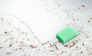 Sponge on a dirty glass.