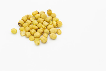 Lotus seeds roasted, Nutritious roasted lotus seeds on white background.