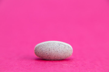 Fototapeta na wymiar pill isolated on pink with clipping path. Medicine and pharmacy concept
