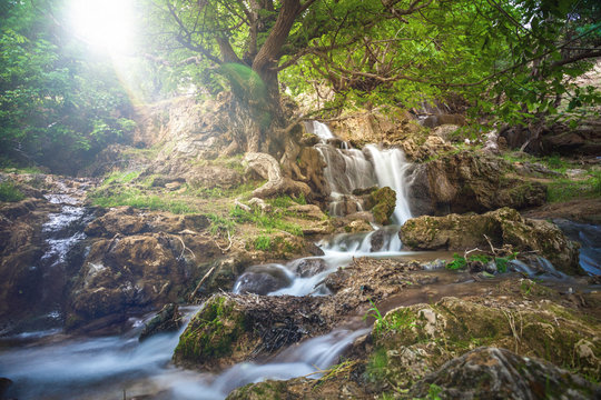 Lense effects with waterfall around Khorramabad County, western Iran. One stop during a roadtrip in Iran. Hiking tours in the mountains and waterfalls. Bisheh, Lorestan Province.