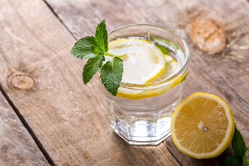 Fresh Lemonade in a Glasses with Lemon Slices and mint
