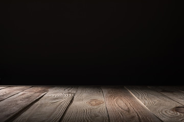 brown striped wooden background on black