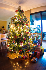 christmas tree with gifts and decorations