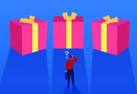 Businessman chooses from three boxes