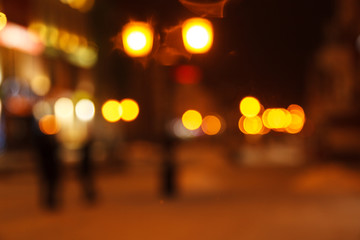 Blurred background of colored lights from lanterns. Image of abstract blurred bokeh background with colored lights. Christmas street lights, blur, bokeh, bokeh lights, bokeh background