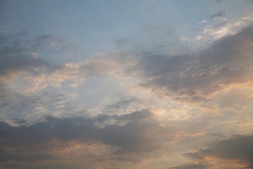 Obraz premium Sky clouds as the best picture. The most abstract background image of the sky. Beautiful sunset. The sun's rays illuminate the clouds.