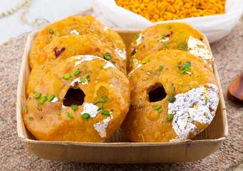 Indian Traditional Sweet Kachori Also Know As Mawa Kachori, Kachauri or Kachodi, Stuffed Kachori With Condensed Milk, Cheese and Dry Fruits And Served With Sugar Syrup