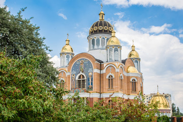 Fototapeta na wymiar Holy Protection Cathedral in summer under blue sky. Kiev, Ukraine