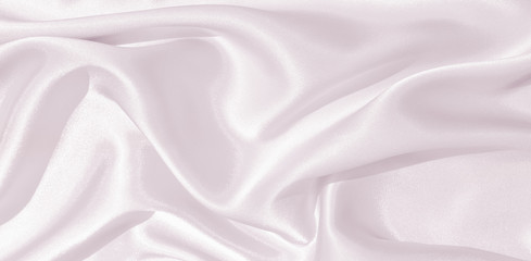 Fototapeta premium The texture of the satin fabric of lilac color for the background