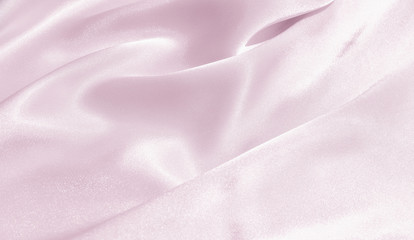 The texture of the satin fabric of lilac color for the background