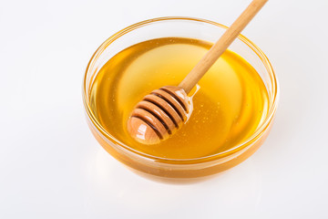 Closeup of fresh honey in glass bowl