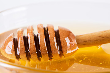 Closeup of fresh honey in glass bowl