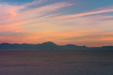 scenic landscape in summer sea and mountain at sunset with copy space 