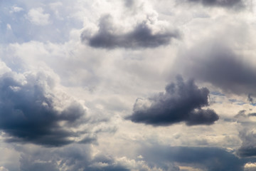 Clouds after rain before sunset as a background