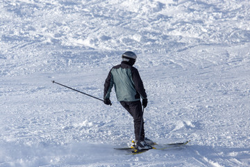 Man skiing in the snow in winter