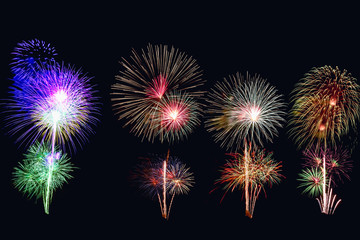 Fireworks of various color bursting against on  black background in festival holiday happy new year