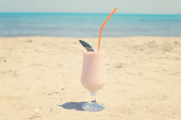 Strawberry Milkshake on the Beach decorated with lime