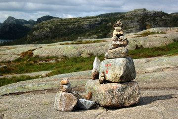Stone cairn on a way to Preikestolen mountain, Norway