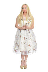 Beautiful woman in dress posing isolated on white