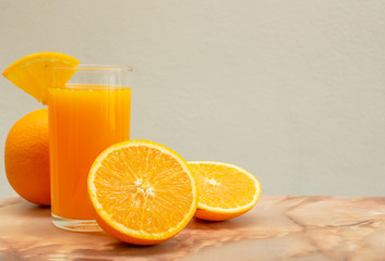 oranges and orange juice on white background,