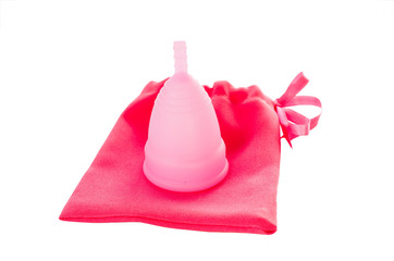 Menstrual cup with bag isolated on white background.