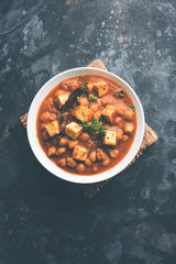 Chole Paneer curry made using boiled chickpea with cottage cheese with spices. Popular North Indian recipe. served in a bowl or serving pan. Selective focus